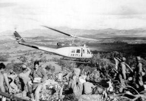 Air-America--Bell-205-helicopter-at-Hmong-FSB