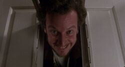 Marv smiling before being hit