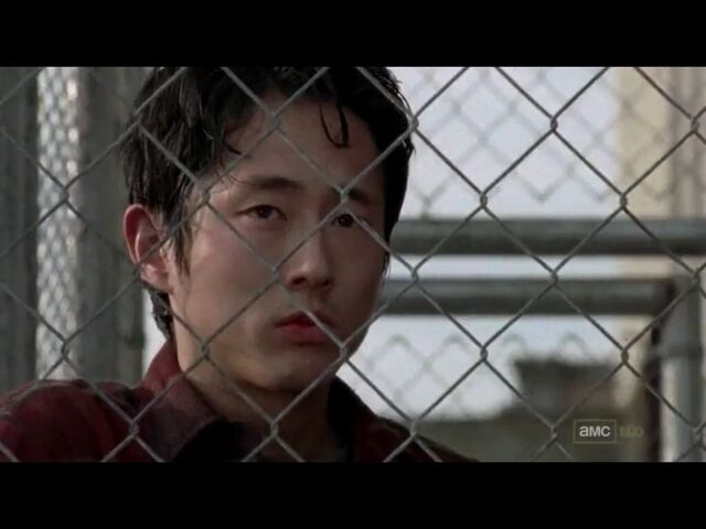 File:Glenn Behind block fence.jpg