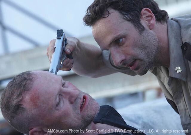 File:Merle Dixon threatened.jpg