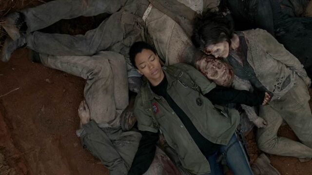 File:Sasha sleeps on zombies.jpg