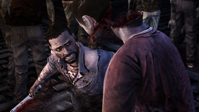 File:Twd-ep-5-screenshot-lee-cuts-zombie-head-in-two.jpg
