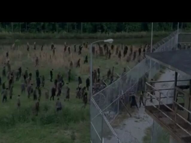 File:Prison vs Walkers.jpg
