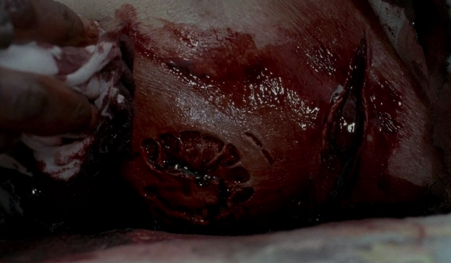 File:6x08 Deanna Bite.png