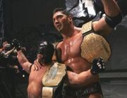 20070820144342-batista-mysterio-tag-team-champions