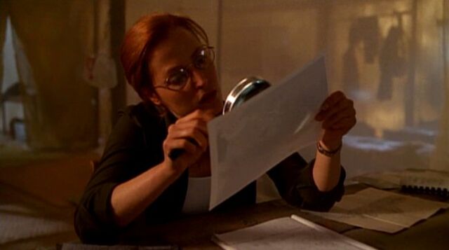 File:Dana Scully studies photograph of Ivory Coast UFO.jpg