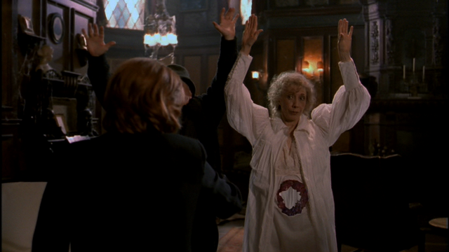 File:Lyda Shows Wound.png