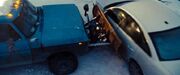 Snowplow truck rams car
