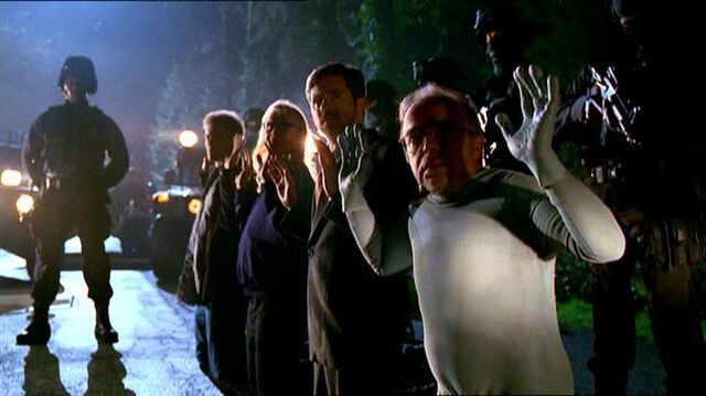 File:The Lone Gunmen and Jimmy Bond on their knees.jpg