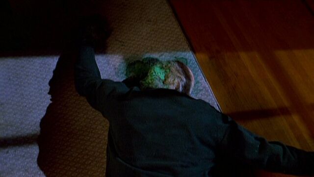 File:Faceless alien lies dead.jpg