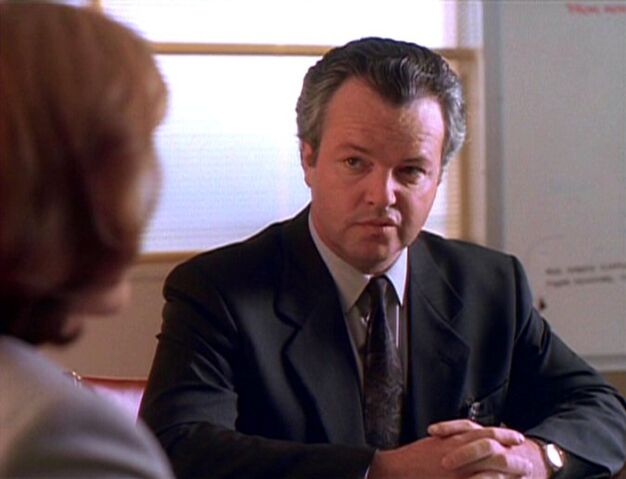 File:Fuller listens to Dana Scully.jpg