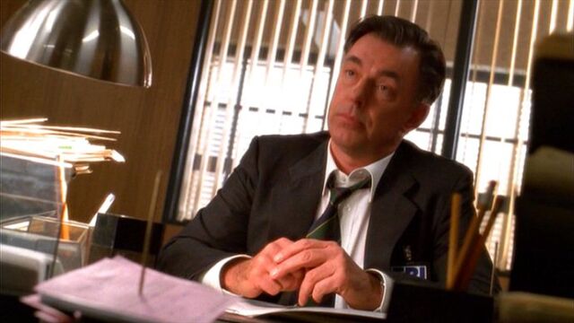 File:Russel in office.jpg