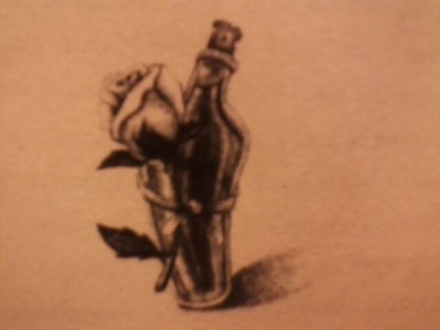 File:Rose oil.jpeg